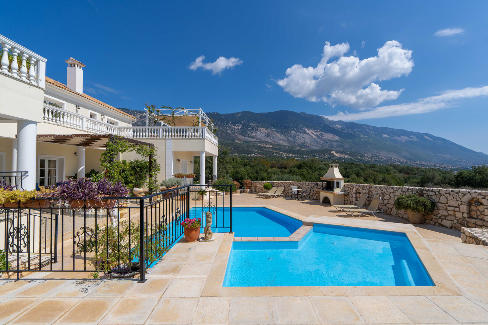 Villa Loukia, luxury villa in Kefalonia Greece - view of the rear garden with large pools