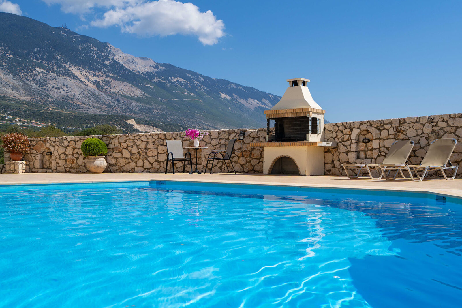 large villa kefalonia - view of the large pool and bbq